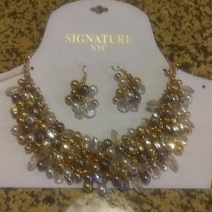 SIGNATURE NYC. Necklace an Earrings collection